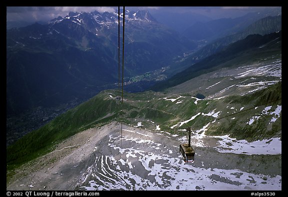 Cable car to Aiguille du Midi, Chamonix Valley in below. Alps, France (color)