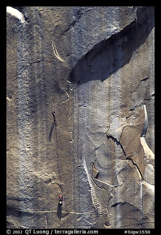 Party on  the Triple Cracks, the crux of the route. El Capitan, Yosemite, California (color)
