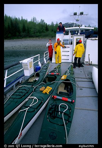 Kayaks loaded on the deck of Glacier Bay Lodge concession boat. Glacier Bay National Park, Alaska (color)