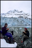 Eating breakfast in front of Lamplugh Glacier. Glacier Bay National Park, Alaska (color)