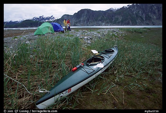 Camp on the flats near McBride Glacier with kayak parked nearby. Glacier Bay National Park, Alaska (color)