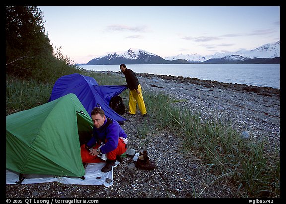Kayakers getting into their tents for the night,  East Arm. Glacier Bay National Park, Alaska