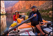 River guide converses with passenger on raft, Marble Canyon. Grand Canyon National Park, Arizona ( color)
