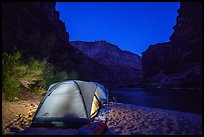 Lighted tent on beach along the Colorado River at night. Grand Canyon National Park, Arizona ( color)