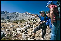 Hikers pointing, Dusy Basin. Kings Canyon National Park, California