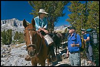 Horseman speaking with hikers, Dusy Basin. Kings Canyon National Park, California