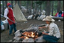 Women preparing food at camp, Le Conte Canyon. Kings Canyon National Park, California ( color)