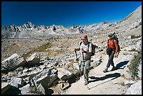 Hikers on trail below Biship Pass, Dusy Basin. Kings Canyon National Park, California