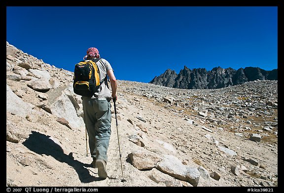 Hiker heading towards Biship Pass, Dusy Basin. Kings Canyon National Park, California