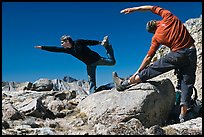 Hikers doing stretching exercises, Bishop Pass. Kings Canyon National Park, California (color)