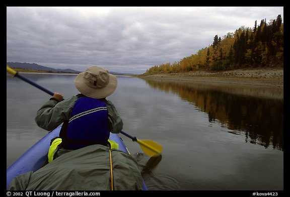 Paddling in the calm waters of the Kobuk River. Kobuk Valley National Park, Alaska (color)
