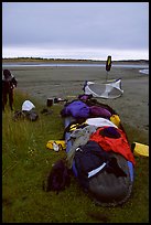 Gear laid out for drying on the bottom of the canoe on a small island of the Kobuk River. Kobuk Valley National Park, Alaska ( color)