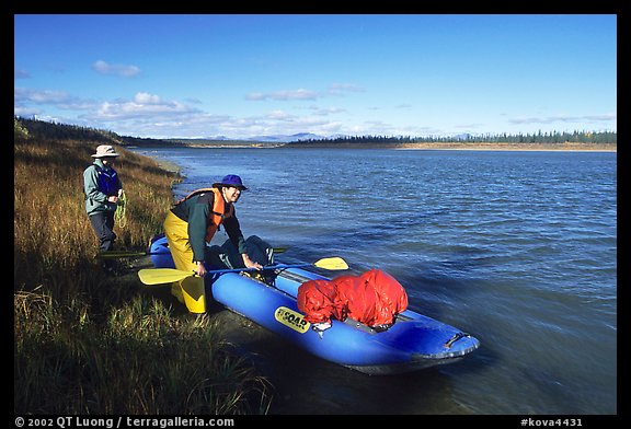 Canoeists prepare to lauch on the Kobuk River. Kobuk Valley National Park, Alaska (color)