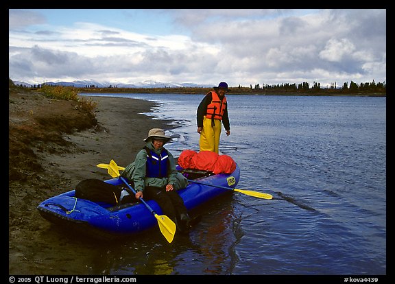Canoeists ready to lauch with the boat loaded up. Kobuk Valley National Park, Alaska (color)