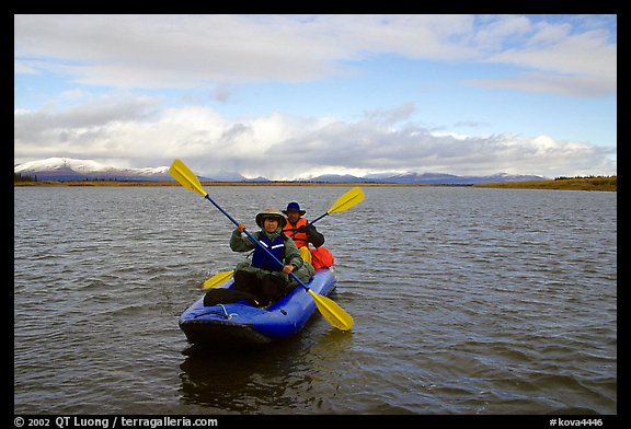 Canoeists Paddling on the Kobuk River. Kobuk Valley National Park, Alaska (color)