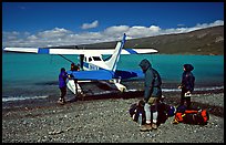 Backpackers dropped off by floatplane on Lake Turquoise. Lake Clark National Park, Alaska ( color)