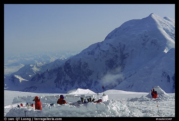 The low-profile tents have to be protected against the wind (which can reach 100mph). Climbers dig a hole and built thick snow-walls by sawing off large chunks of frozen snow. Denali, Alaska