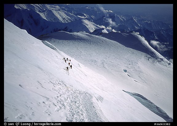 The treacherous Denali Pass, scene of numerous accidents. The descending traverse is somewhat delicate for tired climbers. Moreover some take only ski poles and therefore cannot self-arrest. Denali, Alaska (color)