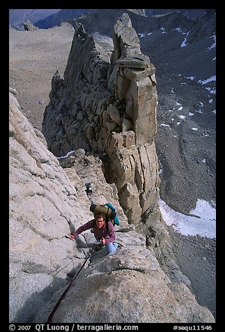 Man climbing East face of Mt Whitney. Sequoia National Park, California