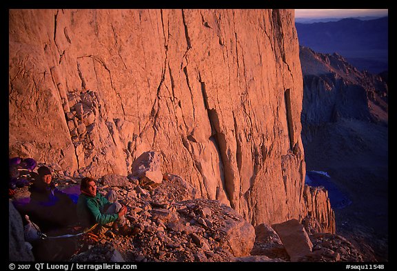 Climbers on a bivy ledge in the East face of Mt Whitney. California (color)
