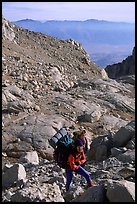 Mountaineers hiking on approach to  East face of Mt Whitney. California ( color)