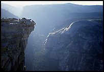 Hanging dramatically from the Jumping Board, Half-Dome. Yosemite National Park, California ( color)