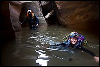 Canyoneers negotiating a deep pool in Pine Creek Canyon. Zion National Park, Utah ( color)