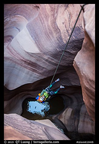 Free rappel seen from above in Pine Creek Canyon. Zion National Park, Utah (color)