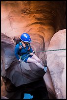Woman setting out for free rappel in Pine Creek Canyon. Zion National Park, Utah ( color)