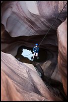 Woman on free hanging rappel in Pine Creek Canyon. Zion National Park, Utah ( color)