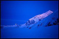 Mt Foraker and moon at twilight. Denali National Park, Alaska, USA.