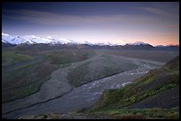 Wide valley with braided rivers and Alaska Range at sunrise from Polychrome Pass. Denali National Park, Alaska, USA.