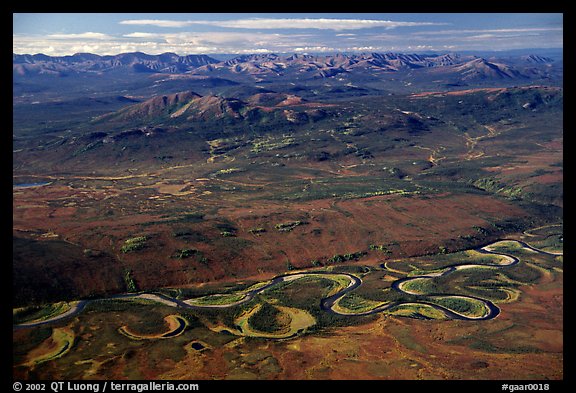 Aerial view of plain with meandering Alatna river and mountains. Gates of the Arctic National Park, Alaska, USA.