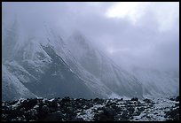 Fresh snow dusts the Arrigetch Peaks. Gates of the Arctic National Park, Alaska, USA.