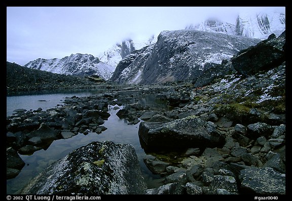 Arrigetch peaks above pond in Aquarius Valley. Gates of the Arctic National Park