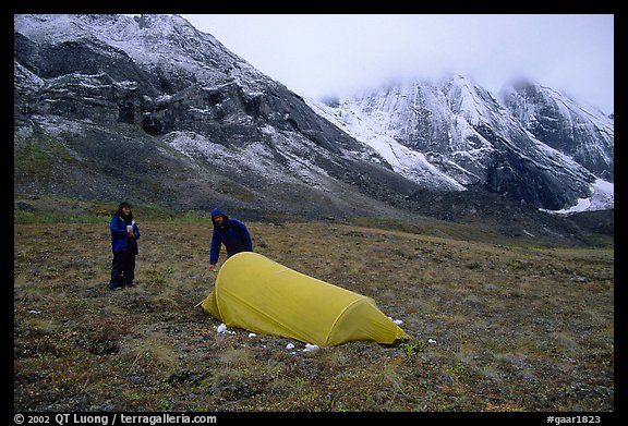 Backpackers camp at the base of the Arrigetch Peaks. Gates of the Arctic National Park, Alaska