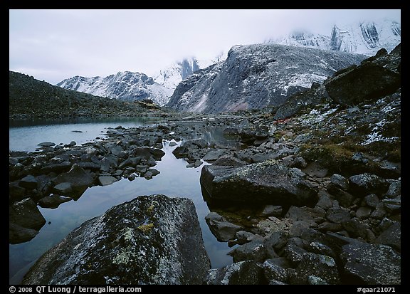 Arrigetch peaks above pond in Aquarius Valley. Gates of the Arctic National Park, Alaska, USA.