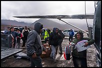Unloading airplane, Anaktuvuk Pass Airport. Gates of the Arctic National Park ( color)