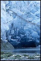 Ice cave at the base of Lamplugh glacier. Glacier Bay National Park, Alaska, USA. (color)