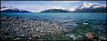 Snowy mountains rising above water. Glacier Bay National Park (Panoramic color)