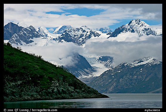 Peaks of Fairweather range with clearing clouds. Glacier Bay National Park (color)