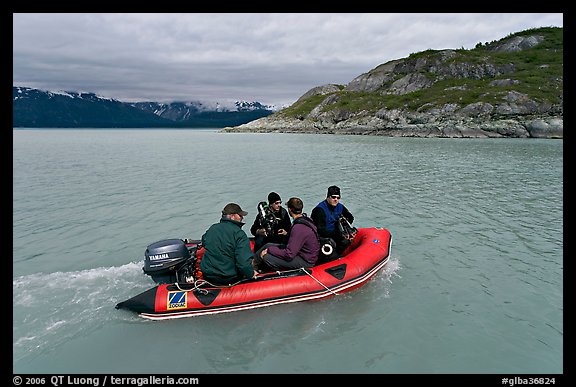 Film crew preparing for landing in a Zodiac. Glacier Bay National Park, Alaska, USA.