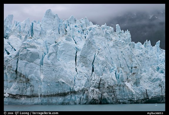 Blue ice on the tidewater terminus of Margerie Glacier. Glacier Bay National Park, Alaska, USA.
