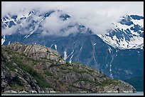 Rocky ridge and snowy peaks, West Arm. Glacier Bay National Park, Alaska, USA. (color)