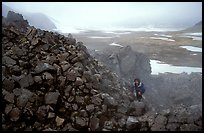 Climbing into the Novaropta crater, where fumeroles are still present, Valley of Ten Thousand smokes. Katmai National Park, Alaska (color)