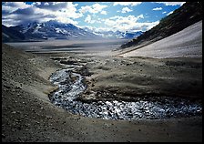 Stream flows from the hills into the floor of the Valley of Ten Thousand smokes. Katmai National Park ( color)