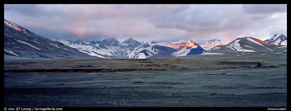 Desert-like ash-covered valley surrounded by snowy peaks. Katmai National Park (color)