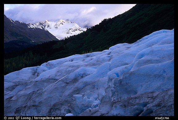 Alaskan Glacier seen from the side, and peaks. Kenai Fjords National Park, Alaska, USA.