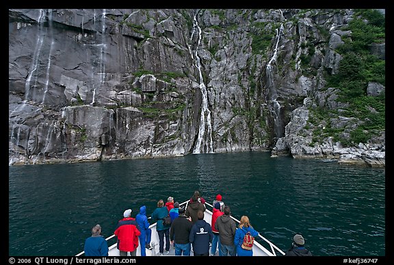 Waterfall viewing from deck of tour boat, Cataract Cove. Kenai Fjords National Park (color)