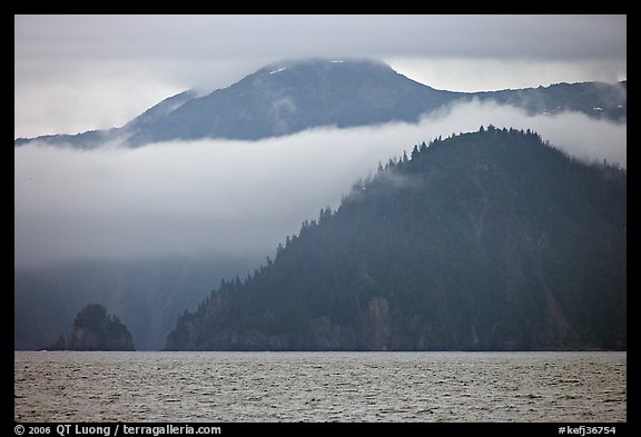 Mountains and fog above Aialik Bay. Kenai Fjords National Park, Alaska, USA.